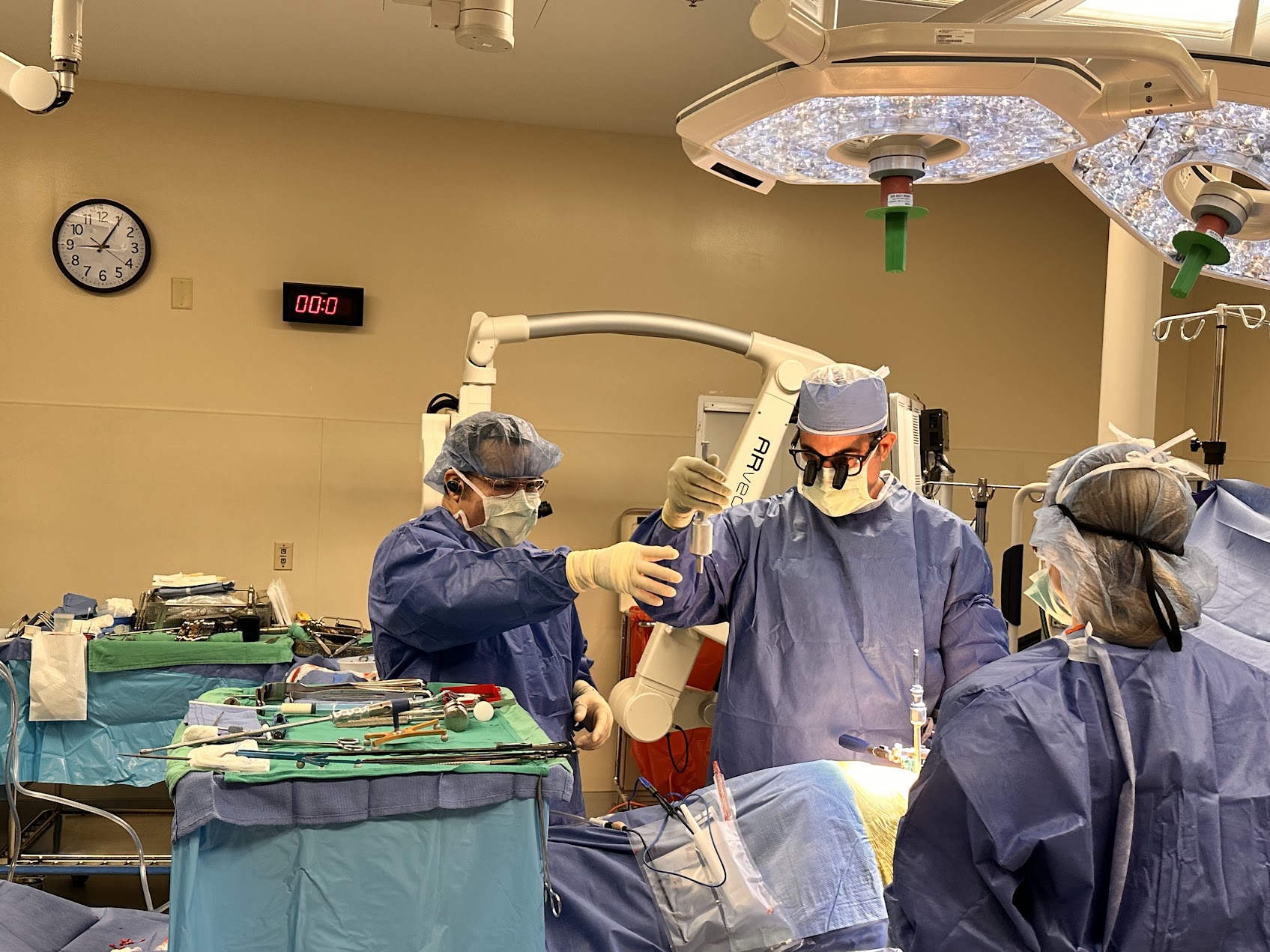 Minimally invasive spine surgery showing a small-incision approach with specialized instruments
